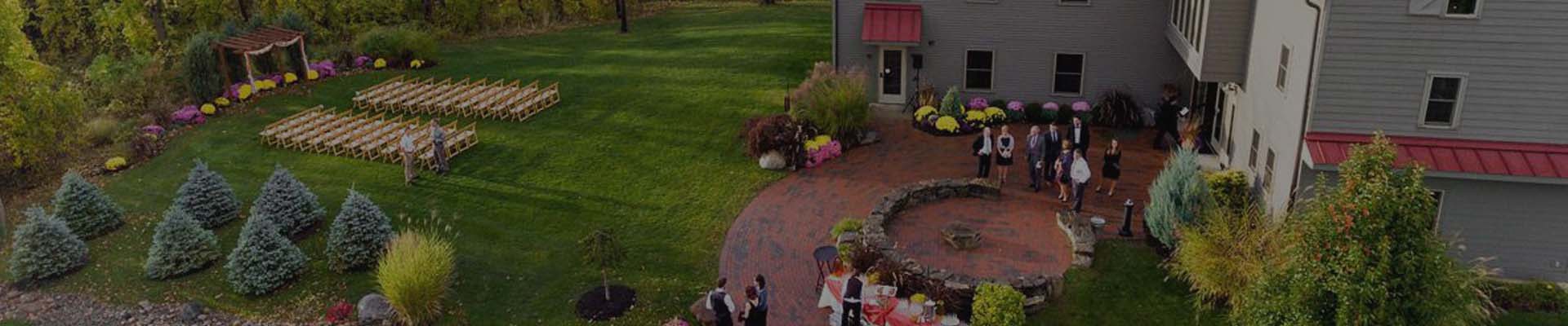 Bridal party celebrating outside of Pat's Barn